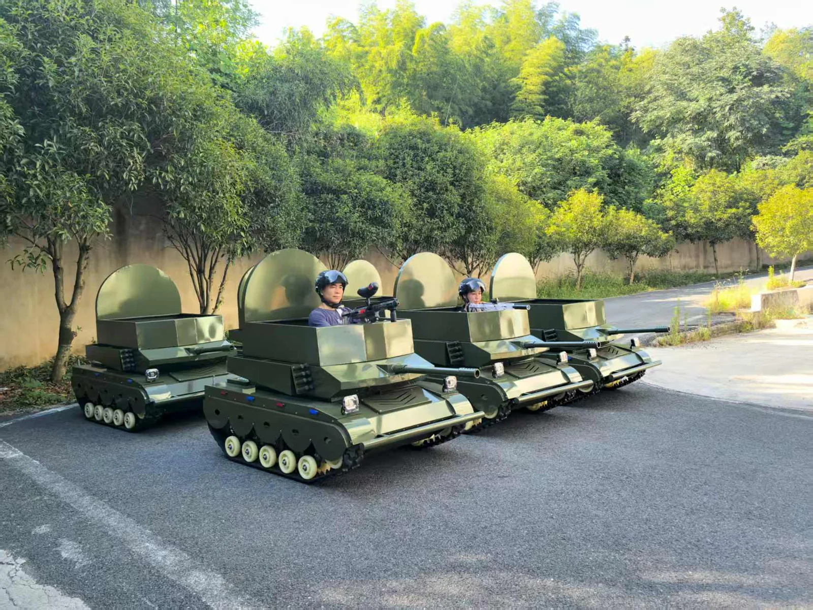 Tracked amusement vehicles displayed outdoors